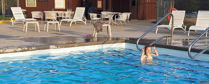 photo of blue water outdoor pool at breeze rv resort