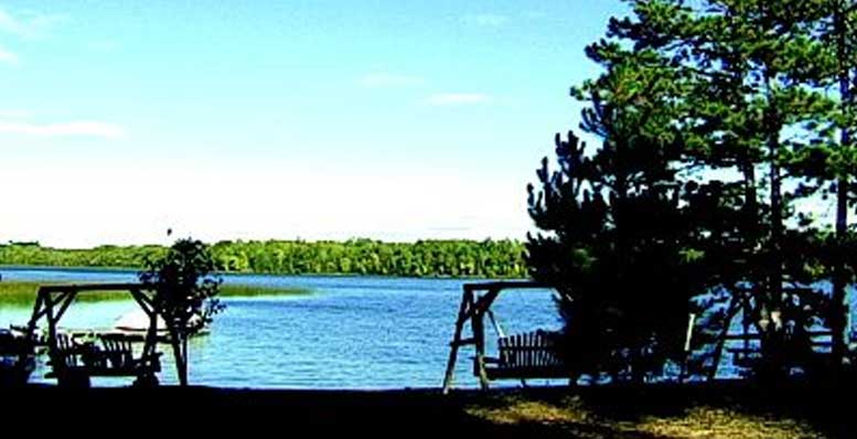 photo of eagle lake water sky and swing